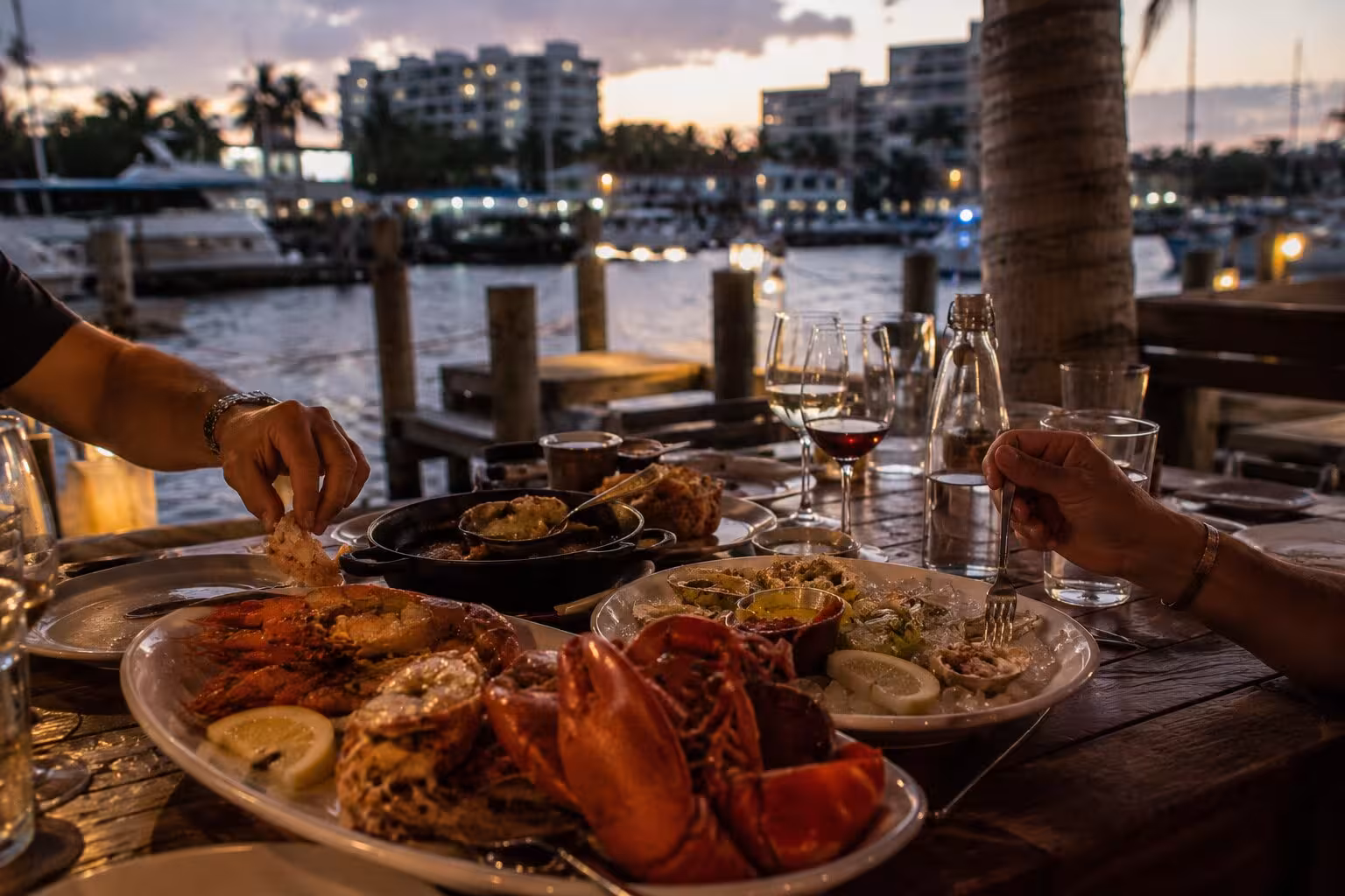 Casual dockside seafood dining with lobster and oysters overlooking the water